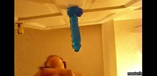  Alexis 19 fucks blue dildo mounted on door and squirts